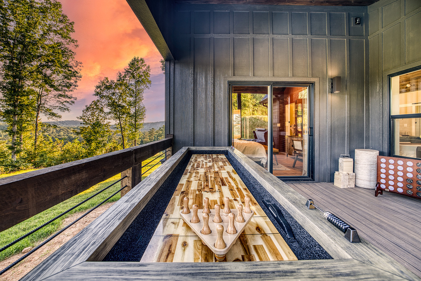 Deck with shuffleboard table at sunset