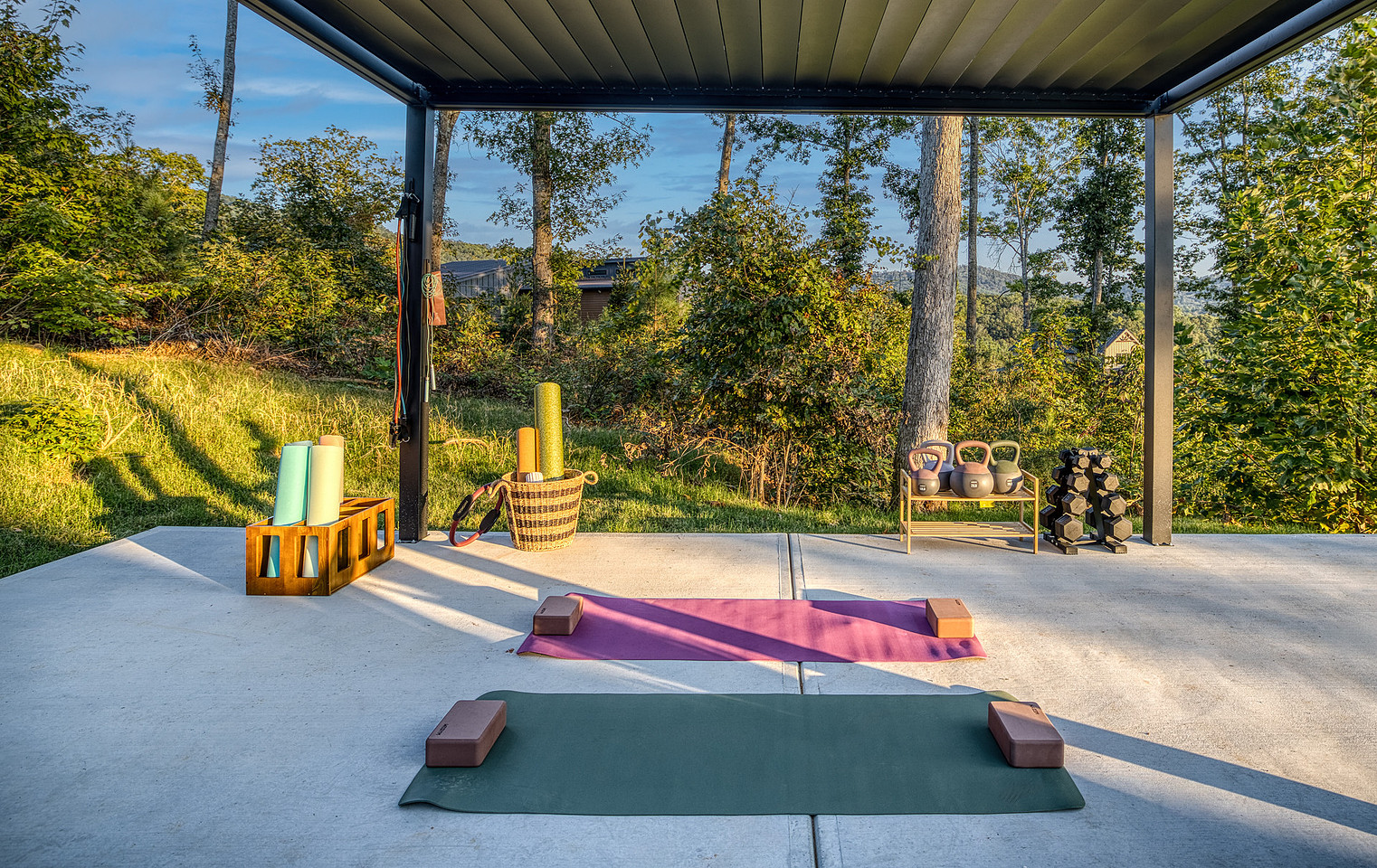Covered outdoor game area with cornhole