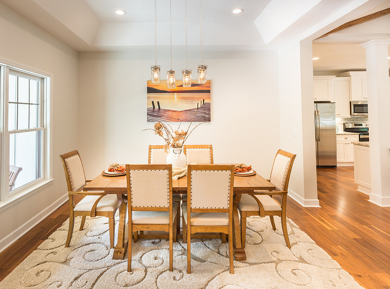 Dining room with a wood table and natural light, real estate photography in North Georgia